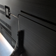 All of Samsung’s top-tier TVs run a single, thin optical cable to an external HDMI box to keep things looking clean.